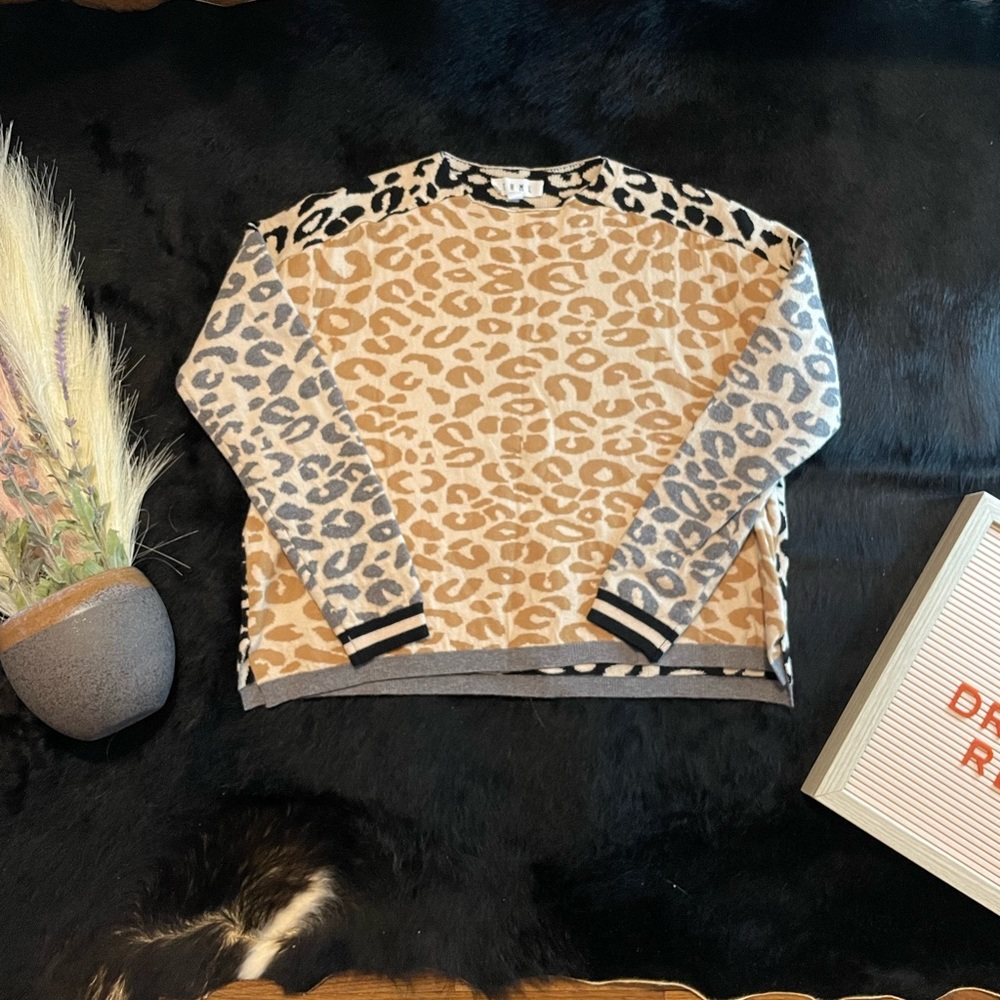 Cheetah Print Sweater Size XSmall, only been wore a handful of time!